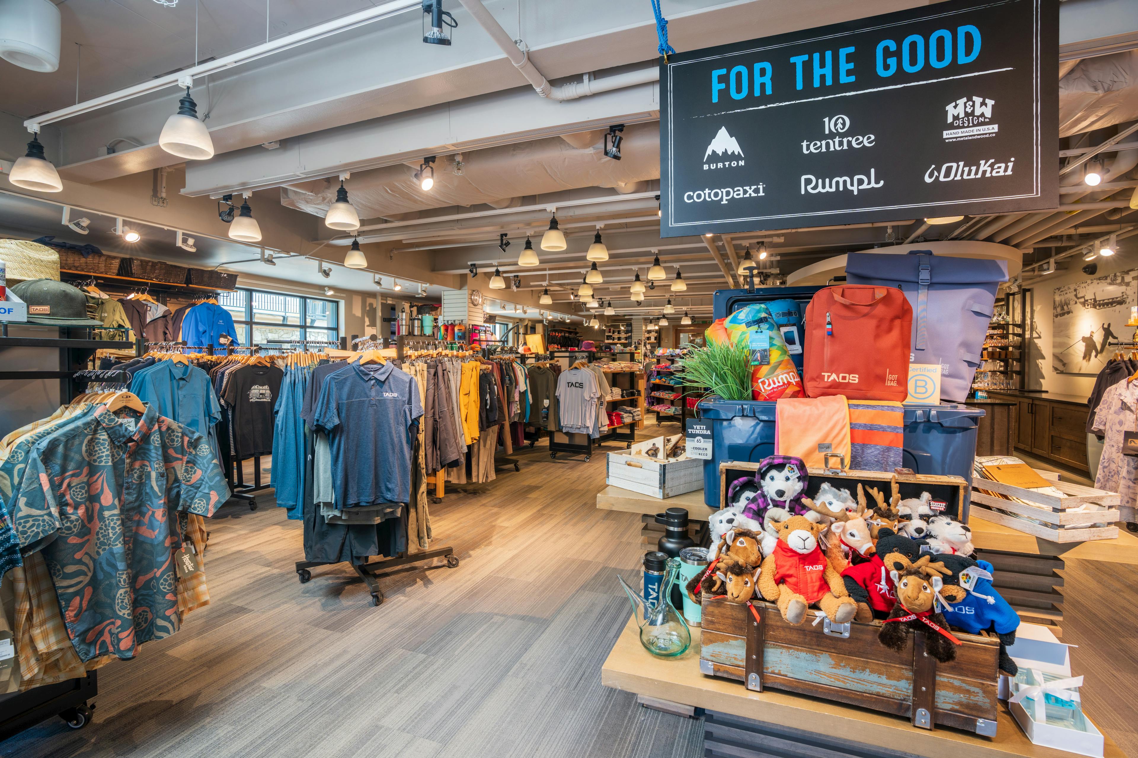 Interior shot of Taos Sports store showing branded outdoor clothing and gear
