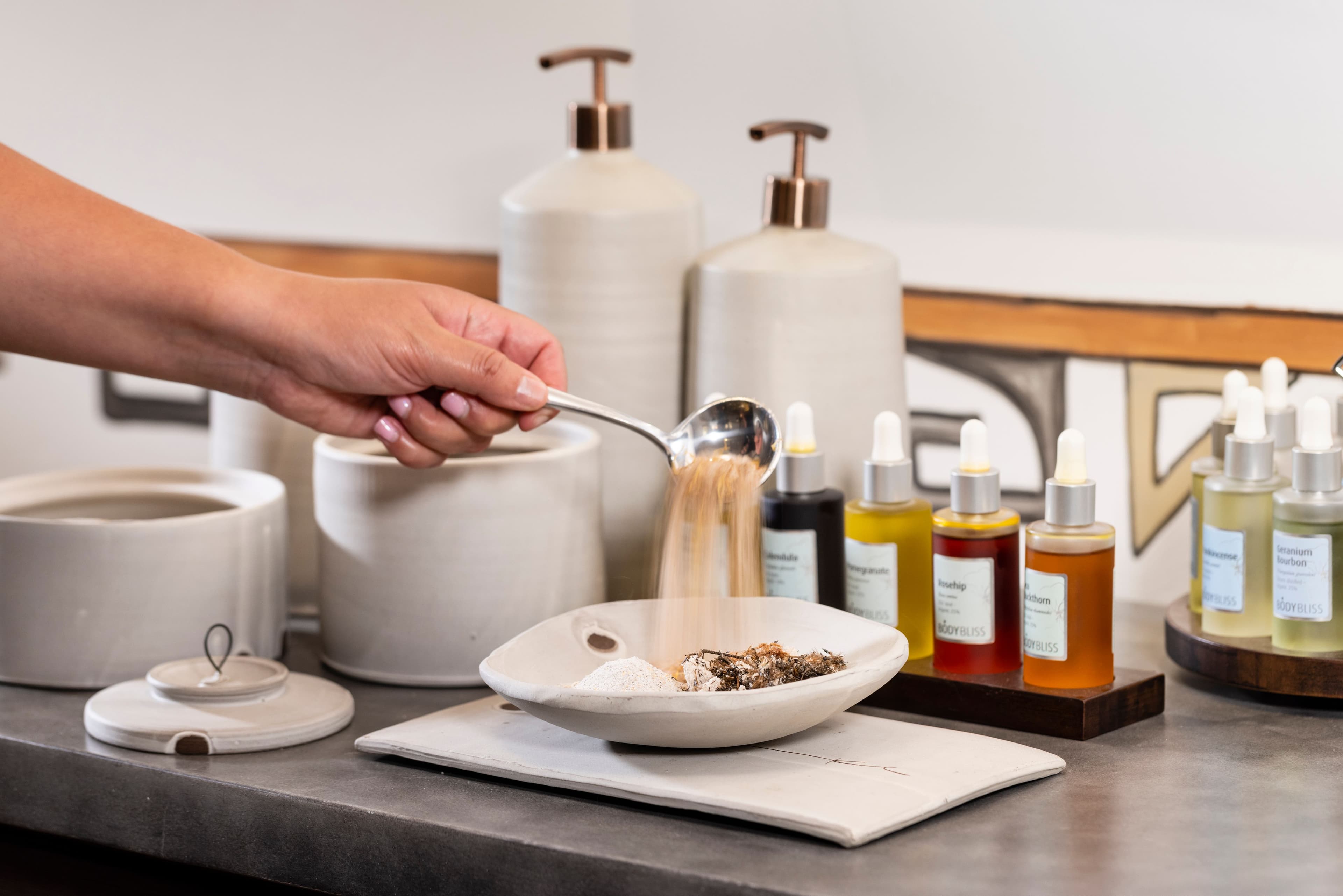 Various scrub ingredients blended together in a stone dish