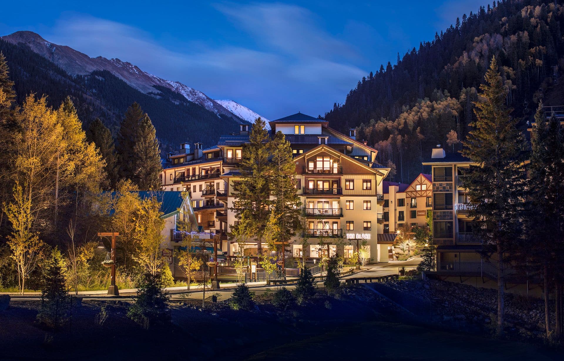 The Blake at Taos Ski Valley lit up at dusk.