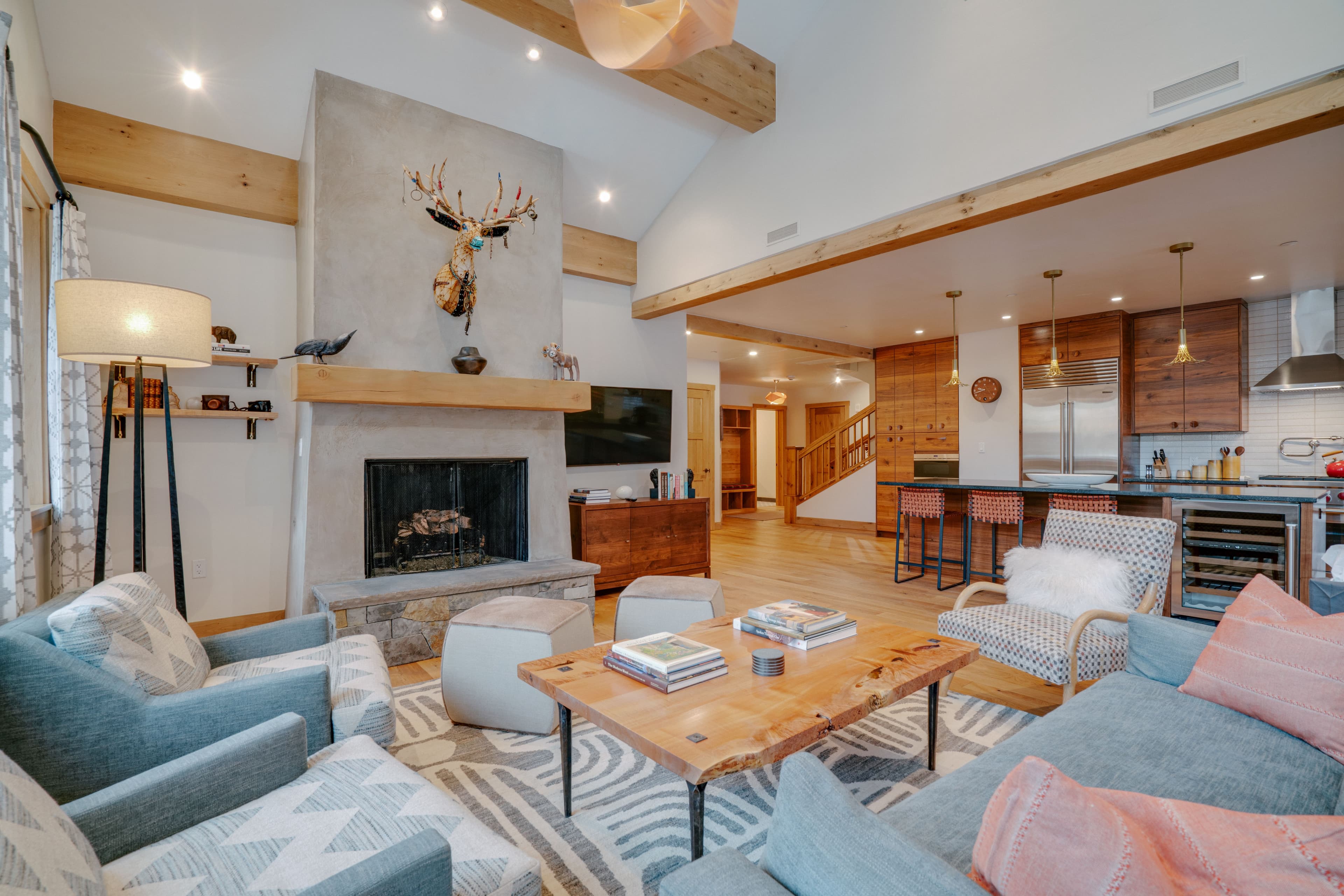 Living room and kitchen at a Four Bedroom Penthouse Deluxe at The Blake
