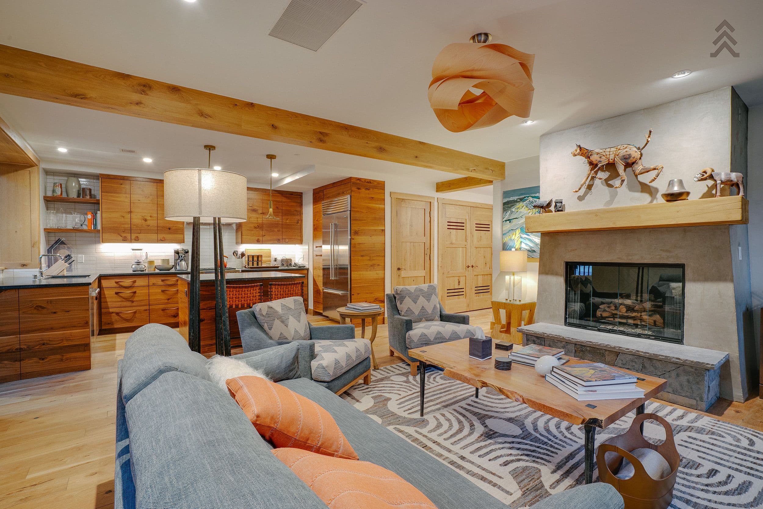 Living room and kitchen in a Penthouse at The Blake at Taos Ski Valley