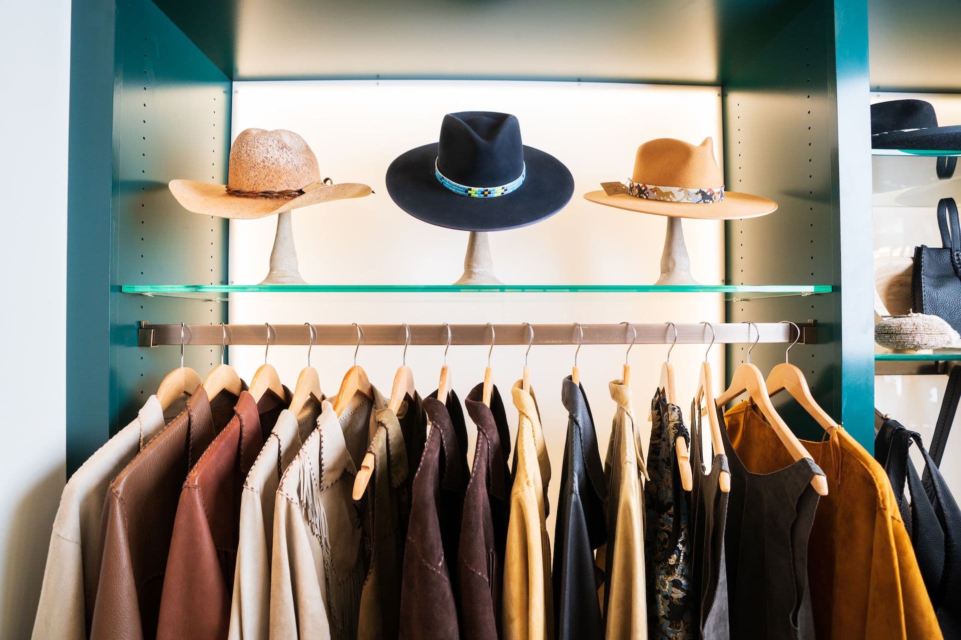 Southwestern jackets and hats on display at Confluence in Taos Ski Valley
